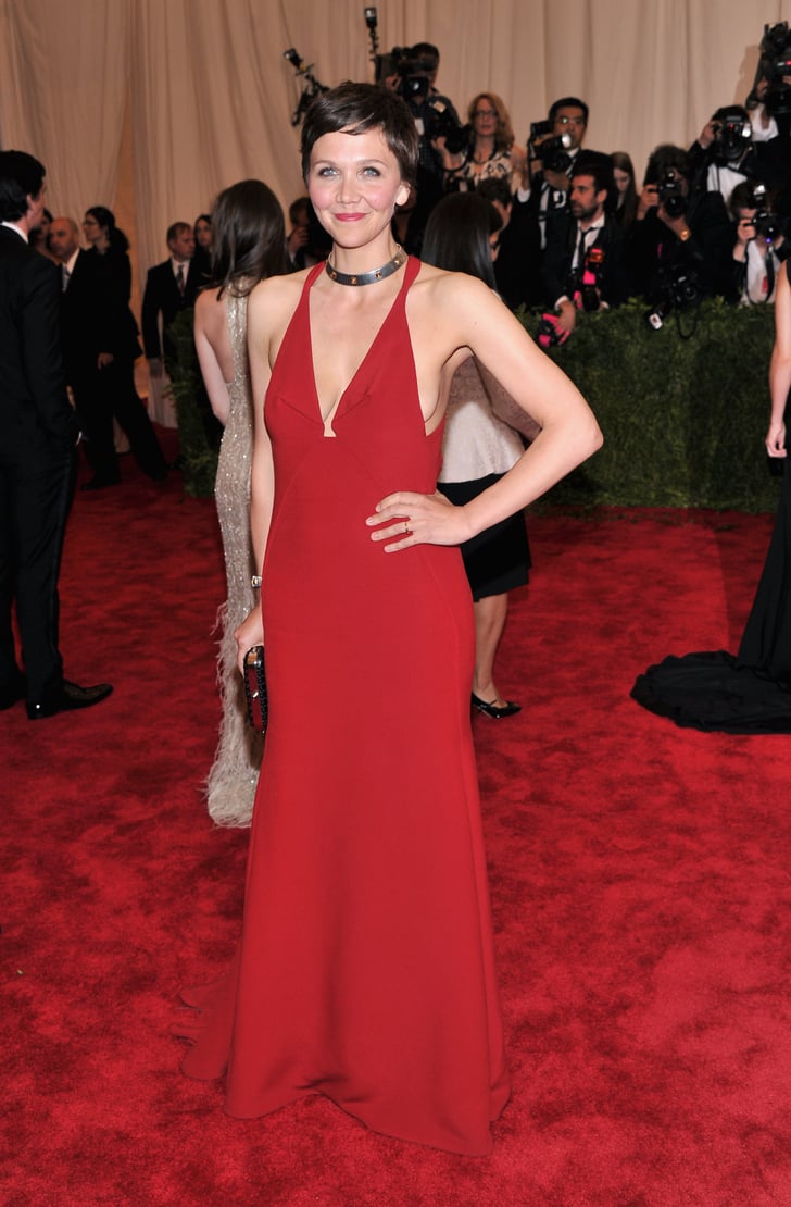 Maggie Gyllenhaal revealed some front and side cleavage in a red | Met