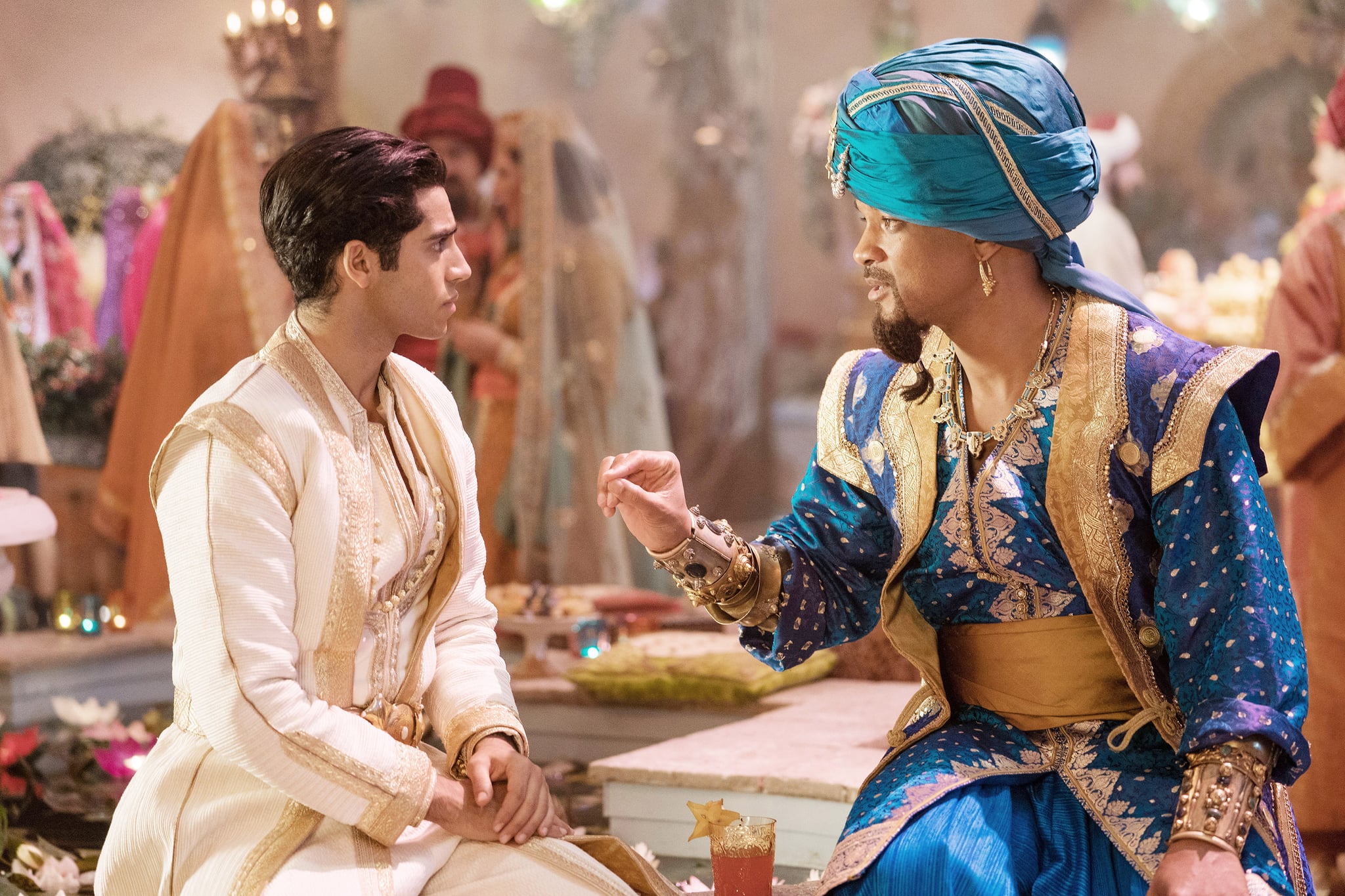 ALADDIN, from left: Mena Massoud as Aladdin, Will Smith as the Genie, 2019. ph: Daniel Smith /  Walt Disney Studios Motion Pictures / courtesy Everett Collection