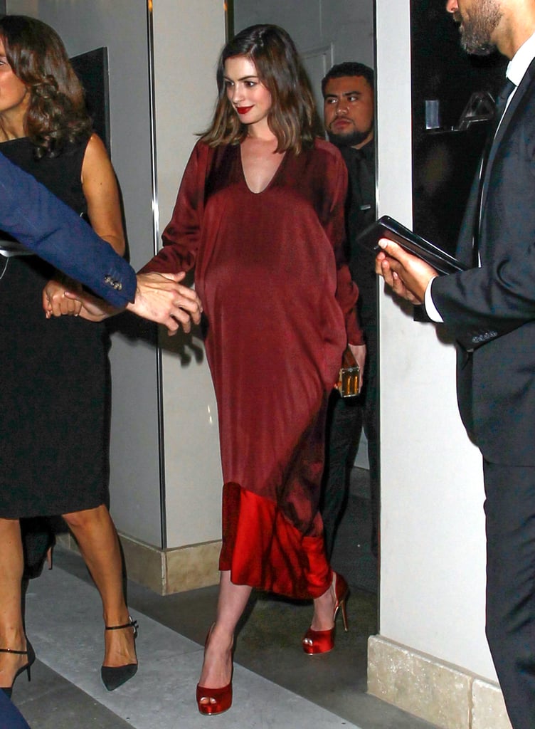 Anne stepped out for a pre-Oscars party in a red hot Zero + Maria Cornejo number, finishing her long dress with perfectly complementing peep-toe platforms.