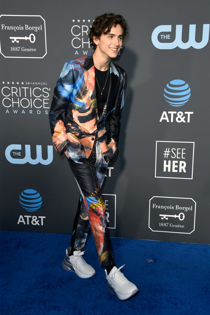 Timothée was a walking work of art in this watercolor Alexander McQueen suit, which he unexpectedly paired with white sneakers, at the 2019 Critics' Choice Awards.