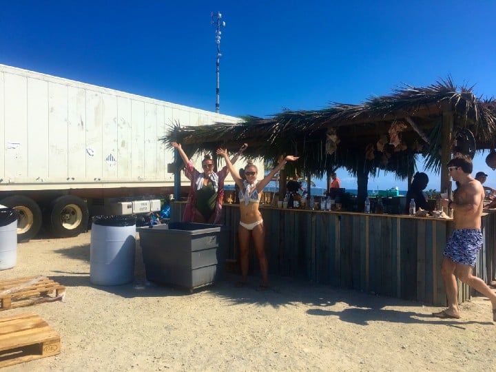 We'll be at the bar if you need us.

Bartenders were bartending their little hearts out and the fun began. We also hung a little speaker from the bar roof and started to play Blink 182 and Ja Rule in true hilarious fashion. Turns out they DID MAKE IT TO THE ISLAND.