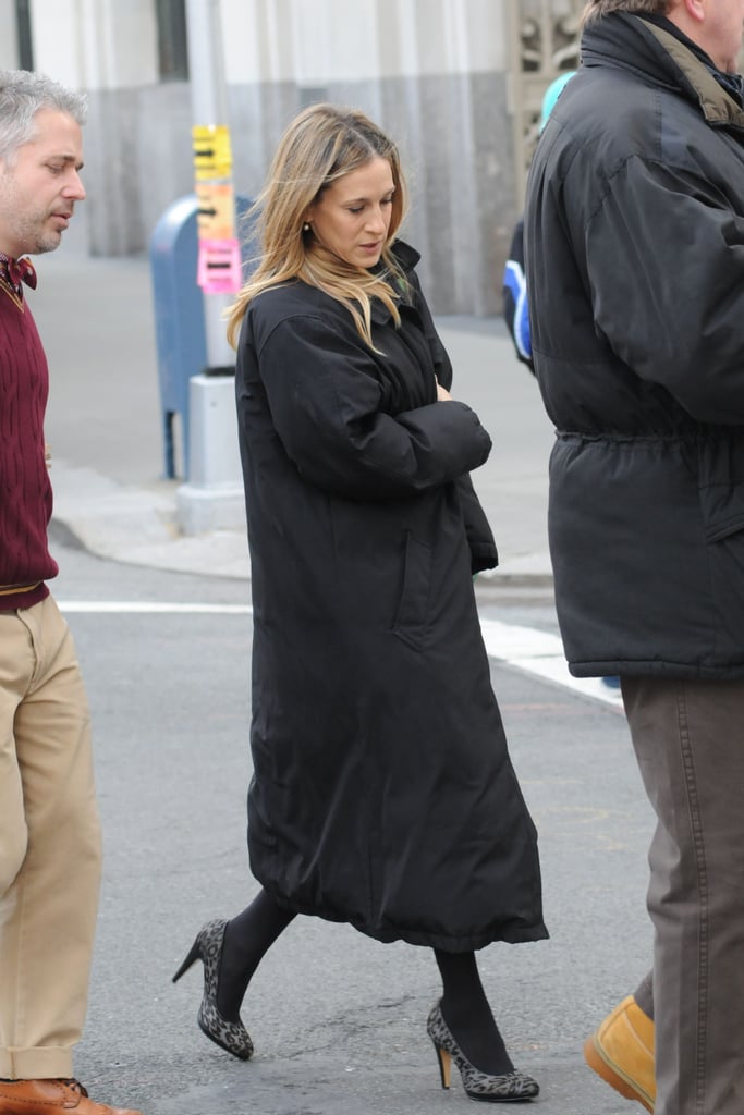 Sarah Jessica Parker spiced up her outfit with fancy shoes yesterday on the NYC set of I Don't Know How She Does It. She's been working alongside Olivia Munn all week, but today SJP welcomed her newest costar, Kelsey Grammer. He showed up with a smile on his face despite the drama with his estranged wife Camille playing out on The Real Housewives of Beverly Hills — she's been busy making the interview rounds to change up her terrible image, and recently visited Lopez Tonight to take back her implications that Kelsey is a cross-dresser. Kelsey may be able to keep his mind off their divorce war, though, by getting down to work with SJP and their other costars Christina Hendricks and Seth Meyers.