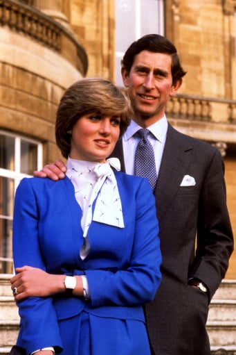 Prince Charles and Princess Diana stood for engagement portraits. Notice the sapphire ring Kate wears today. 
Source: