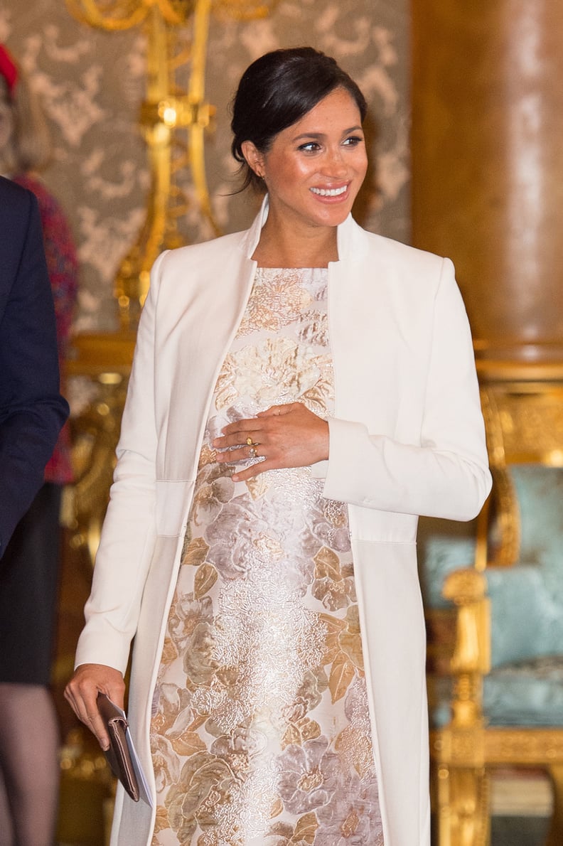 Meghan in a Metallic Brocade Dress