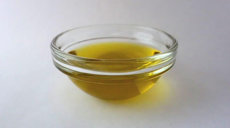 Dabbing nails in olive oil for a healthier look.