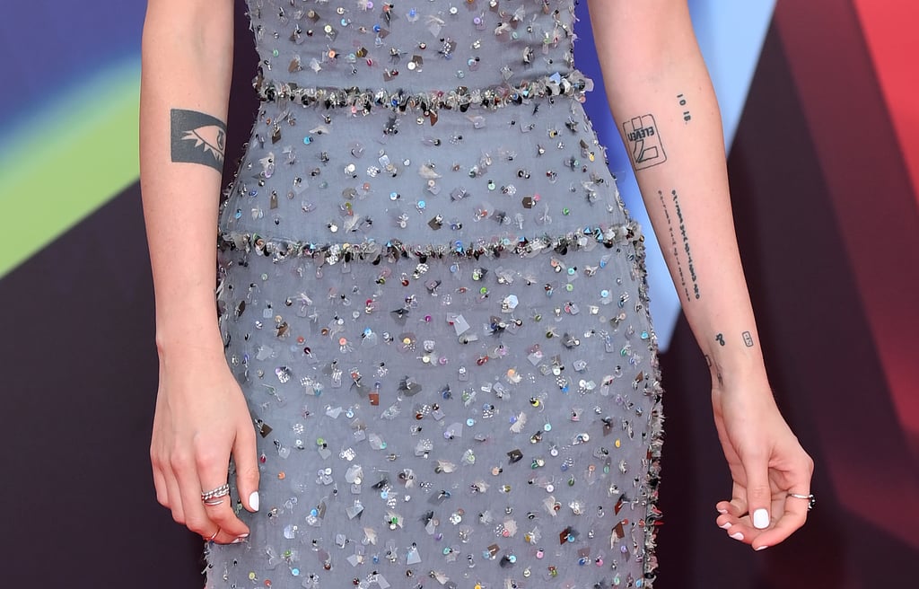 Stewart has a smattering of other tattoos located on her inner left forearm. On the inside fold of her left elbow is the logo for 7-Eleven, a convenience store chain in the USA. Right beside it, the actor also has the the numerics "10 18" inked near the fold. She has not shared the significance behind either design.