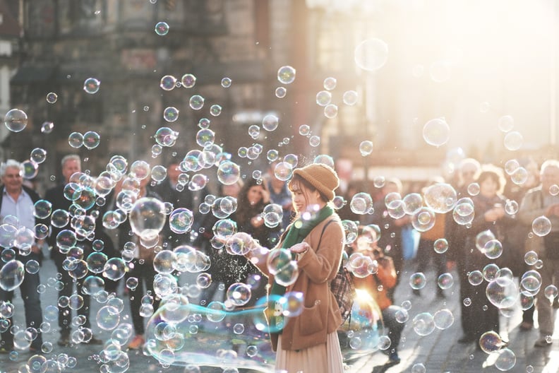 Blow bubbles.