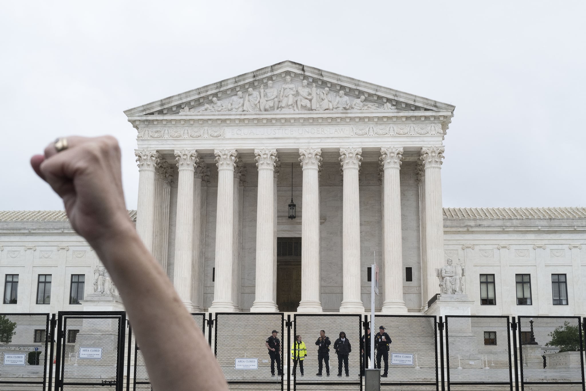 WASHINGTON DC - JUNE 23 Abortion rights and anti abortion protesters gathered in the rain outside the US Supreme Court on June 23, 2022 in Washington, DC. Both sides are awaiting a decision on the landmark Roe v. Wade case but none was issued on Thursday. (Photo by Michael Robinson Chavez/The Washington Post via Getty Images)