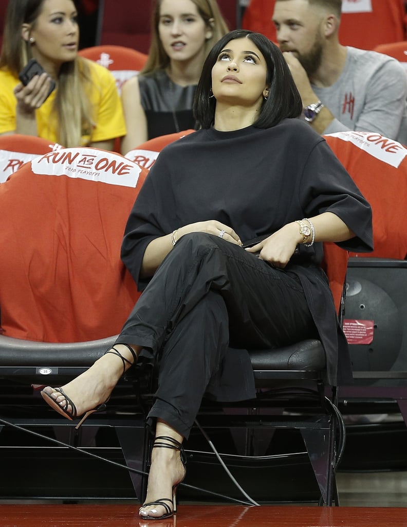 Kylie Jenner in Heels and Sweatpants at a Basketball Game