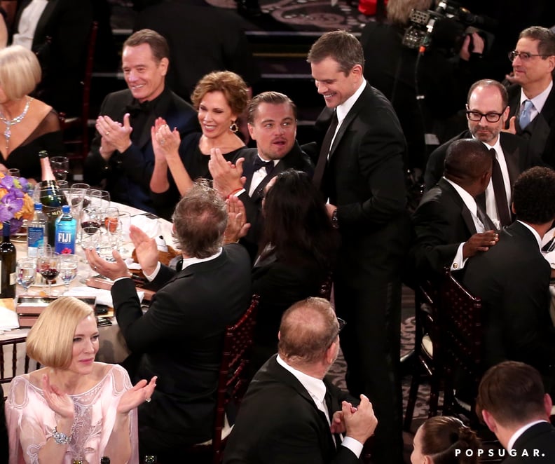 Leonardo DiCaprio got a visit to his table by Matt Damon.