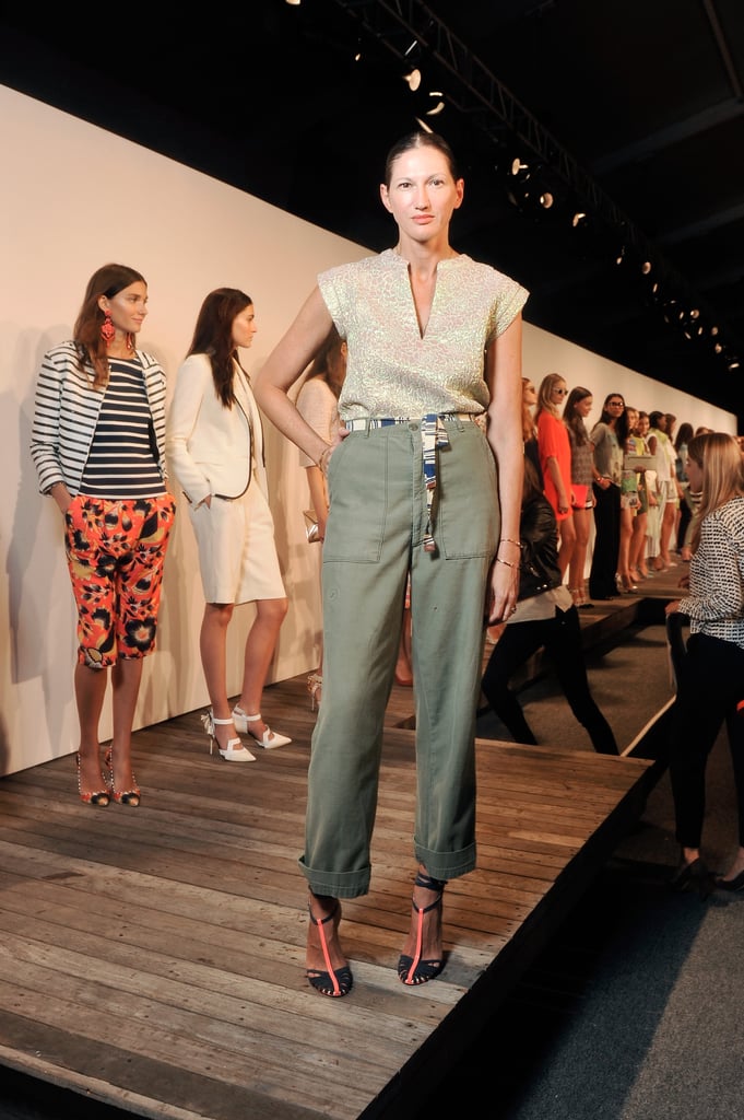 To show off J.Crew's Spring 2014 lineup, Lyons tucked a sparkly gold top into high-waisted pants and accessorized with t-strap heels and a casual belt.