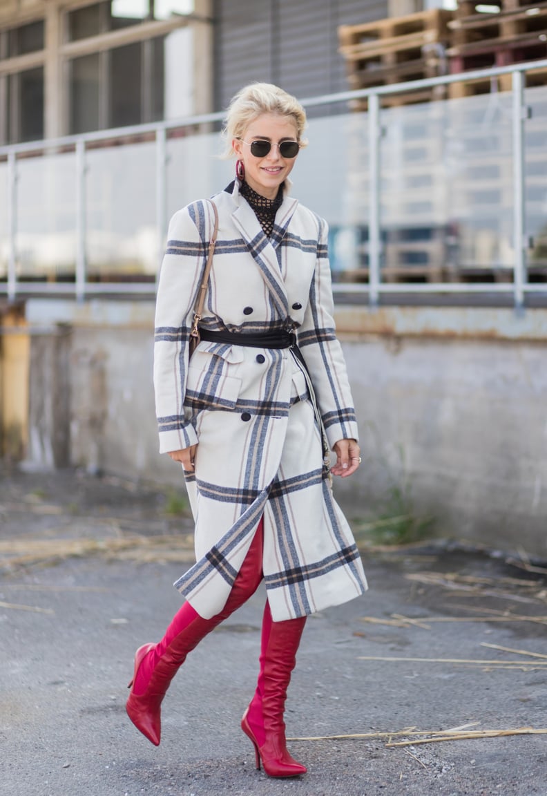 Cinch a Plaid Coat With a Belt and Complete With High Boots