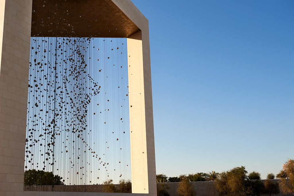 The 30x30x30m structure made up of 1,327 suspended shapes that form his image