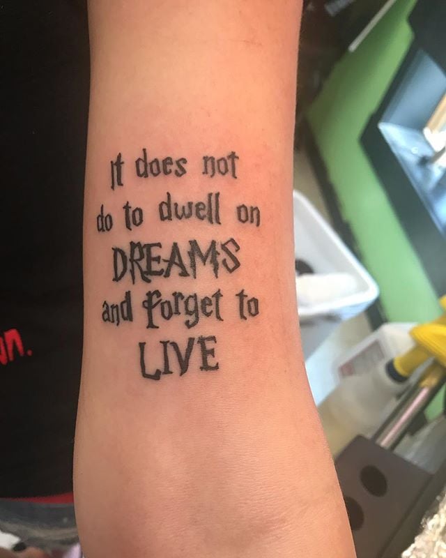 "It does not do to dwell on dreams and to live." Quote Tattoos