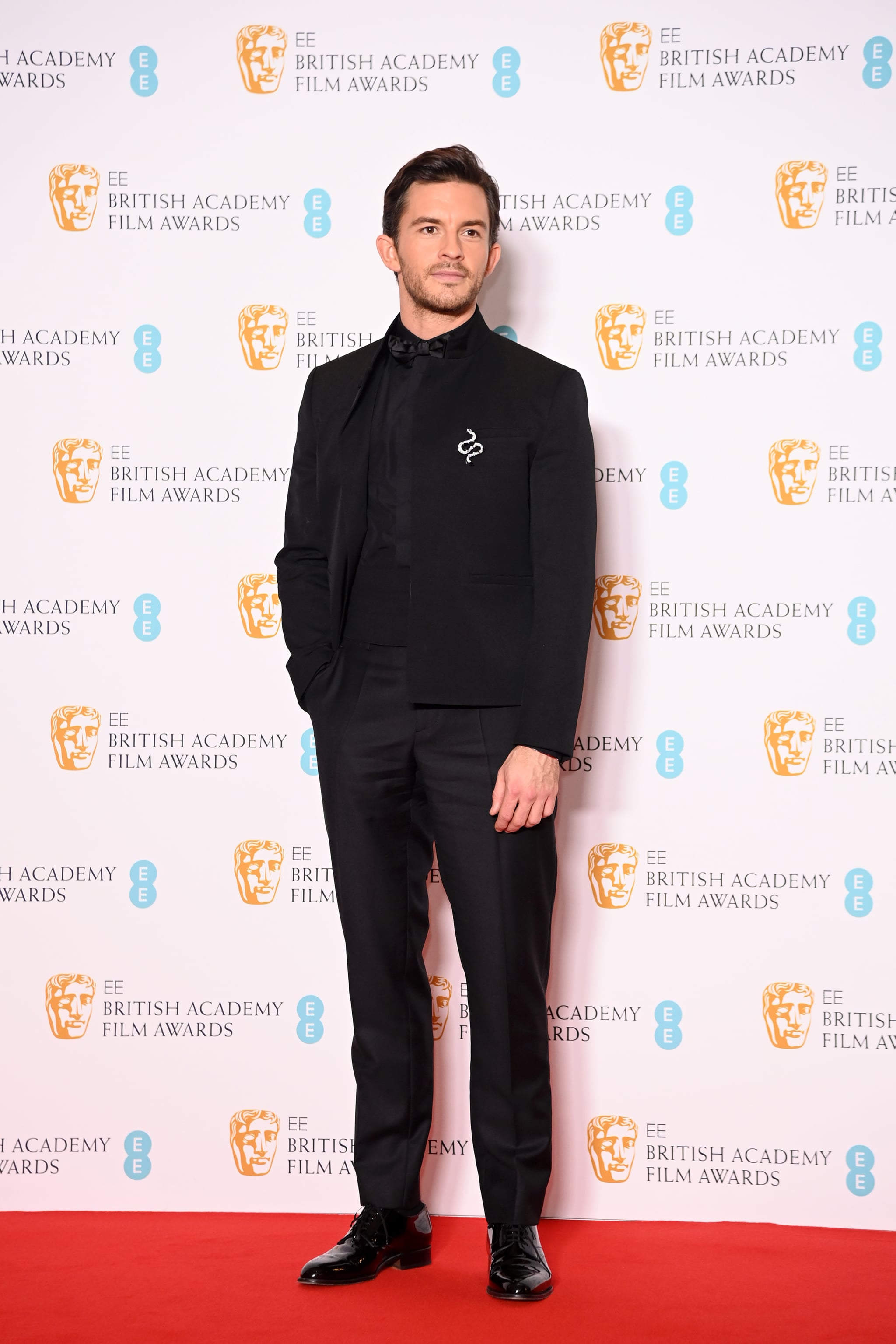 LONDON, ENGLAND - MARCH 13:  Jonathan Bailey poses in the winners room at the EE British Academy Film Awards 2022 at Royal Albert Hall on March 13, 2022 in London, England.  (Photo by David M. Benett/Dave Benett/Getty Images)