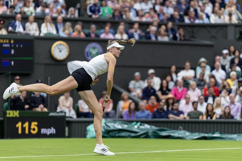 LONDON, ENGLAND - JULY 4.  Elena Rybakina of Kazakhstan serving against Shelby Rogers of the United States in the Ladies' Singles first round match on Centre Court during the Wimbledon Lawn Tennis Championships at the All England Lawn Tennis and Croquet C