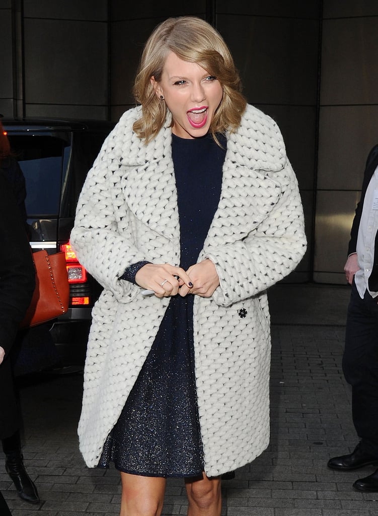 Taylor Swift looked overjoyed outside London's BBC Radio 1 studios on Tuesday.