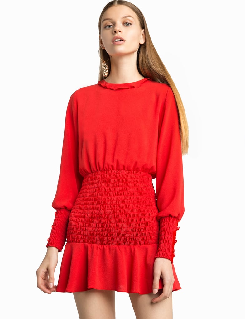 The perfect mix of body-conscious and comfortable, the Pixie Market Beatrice Red Smocked Dress ($126) is sure to become your seasonal go-to.