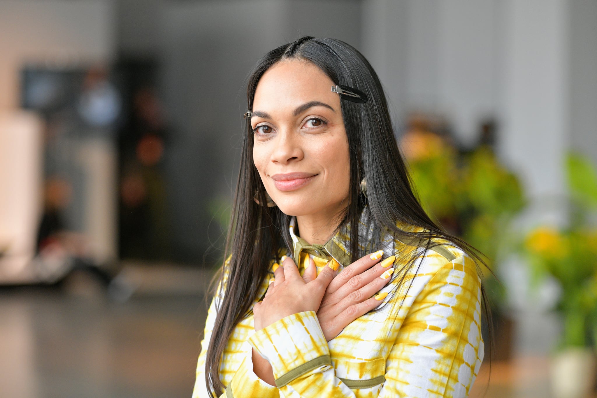 Rosario Dawson before getting a bowl cut