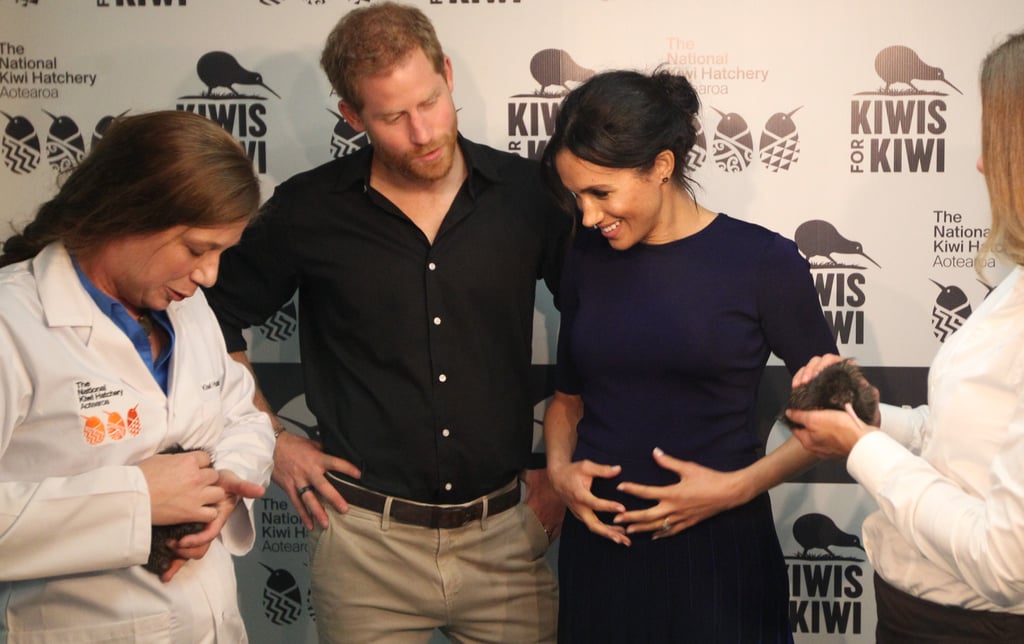 Meghan Markle Touching Baby Bump Pictures