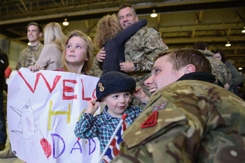 A member of 617 Squadron was all smiles when he was reunited with his family.