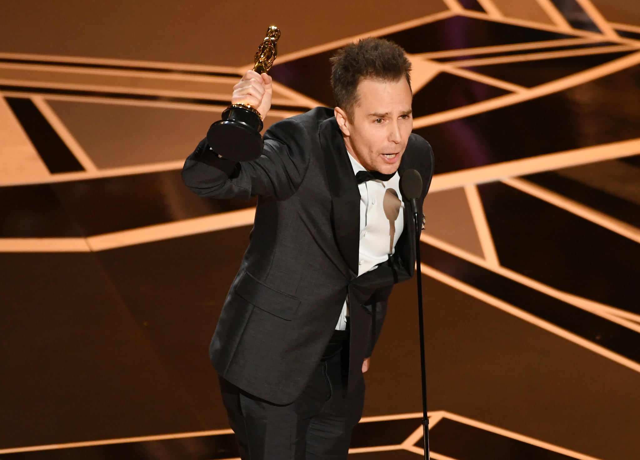 HOLLYWOOD, CA - MARCH 04:  Actor Sam Rockwell accepts Best Suppoorting Actor for 'Three Billboards Outside Ebbing, Missouri' onstage at the 90th Annual Academy Awards at the Dolby Theatre at Hollywood & Highland Center on March 4, 2018 in Hollywood, California.  (Photo by Kevin Winter/Getty Images)
