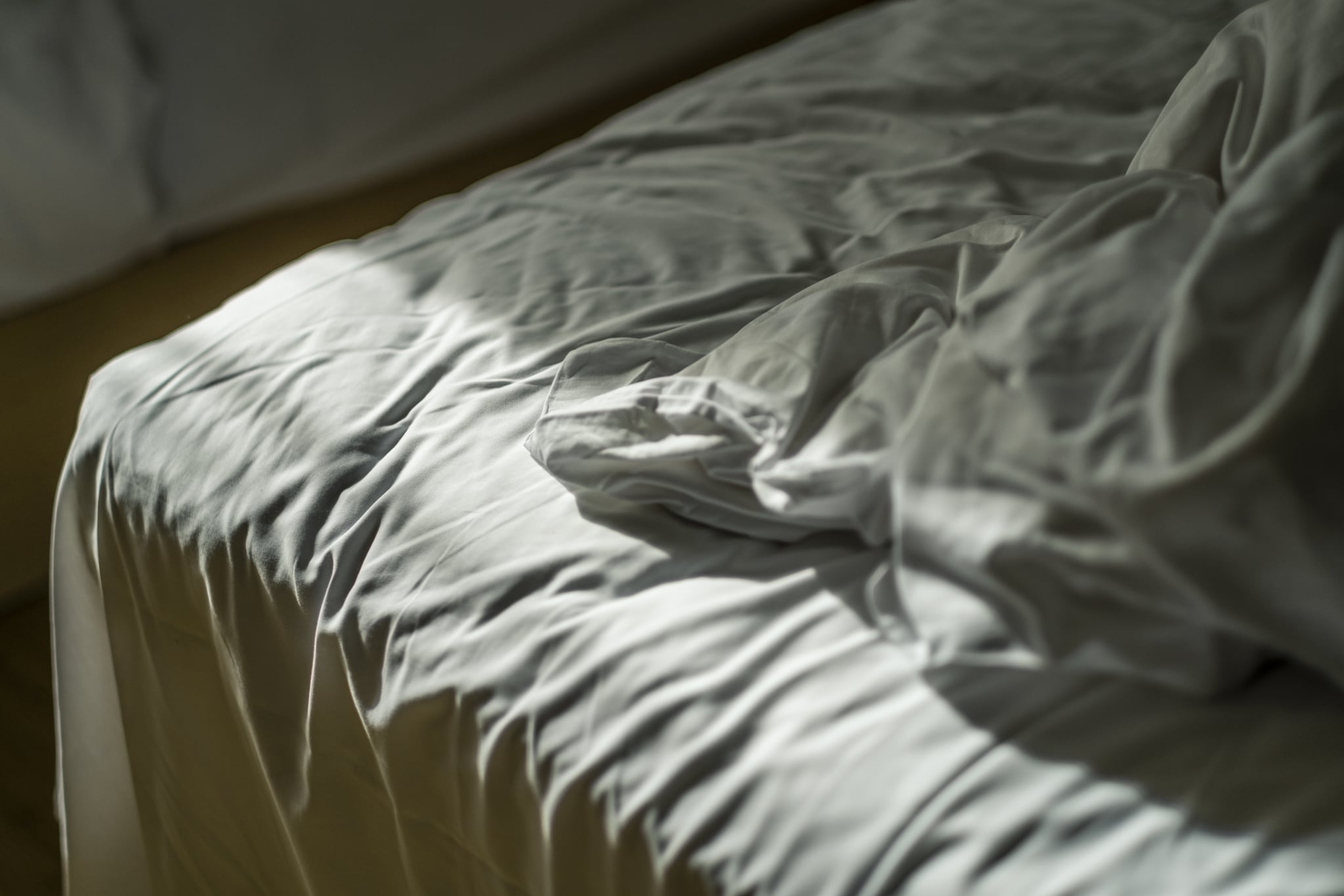 crumpled bedsheets