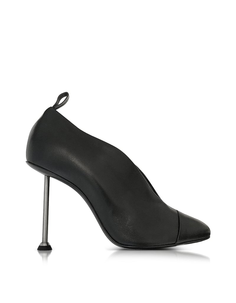 Victoria Beckham famously stomped around New York in her nail-heeled Pin Black Leather Pumps ($980) prior to their debut.
