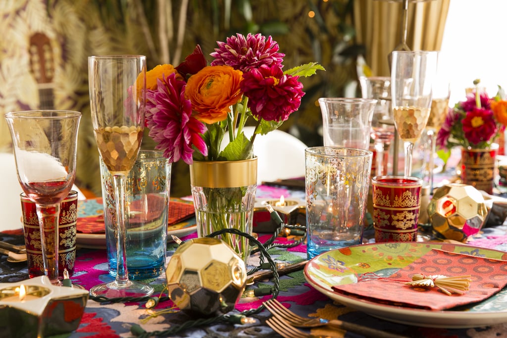 The rich table setting is primed for lots of merriment and drinking. Justina explained, "I gave each person three glasses! It just automatically makes everything feel fancy and special!" The rose-colored wine glasses were hand-me-downs from Justina's grandmother. "They have celebrated so many occasions with me and my family."