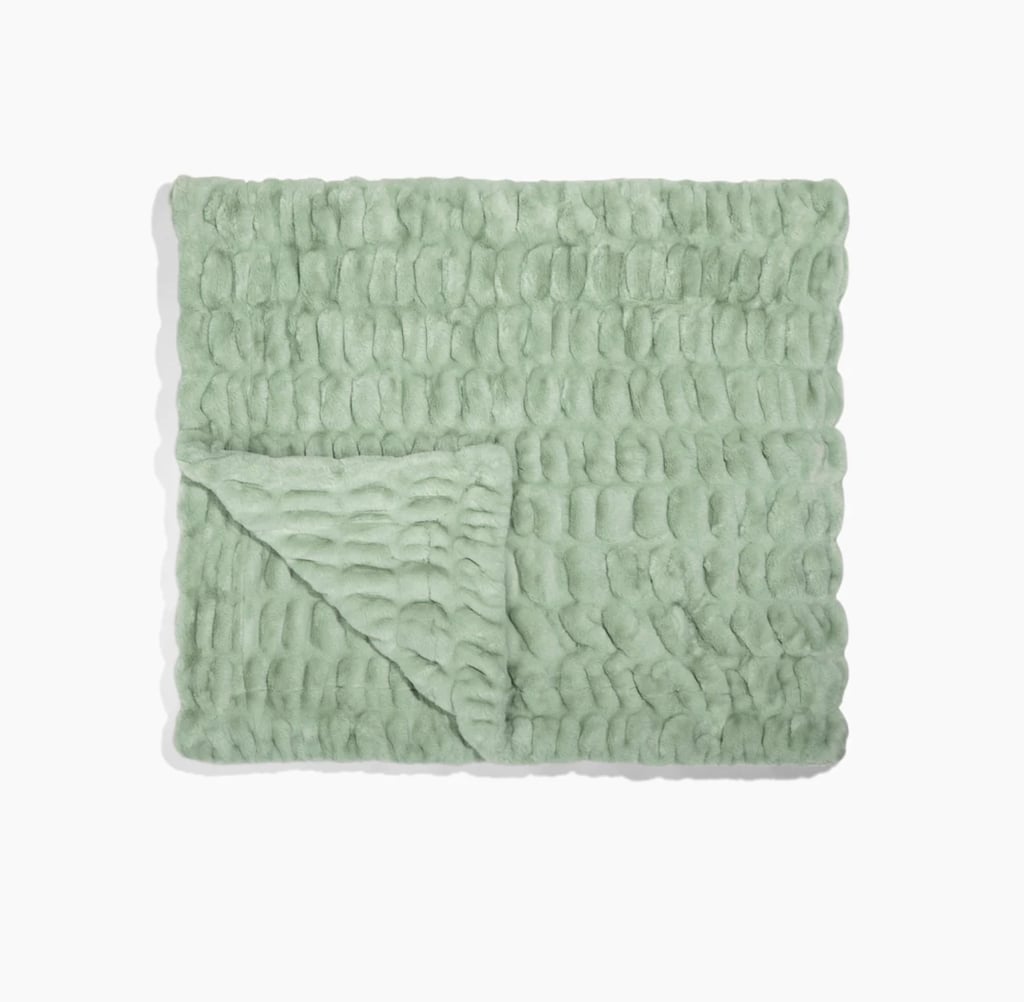 Lola Blanket Blush Pink Blanket ($325)
When it comes to getting the best sleep of your life, it's hard not to melt into a Lola Blanket. Available in multiple sizes, these blankets transport you to another place in time. It's like being wrapped in a warm hug — and yes, they even have a slight weight to them. Pick up the colors in their new spring collection, including greenhouse (shown), peony, and wisteria.