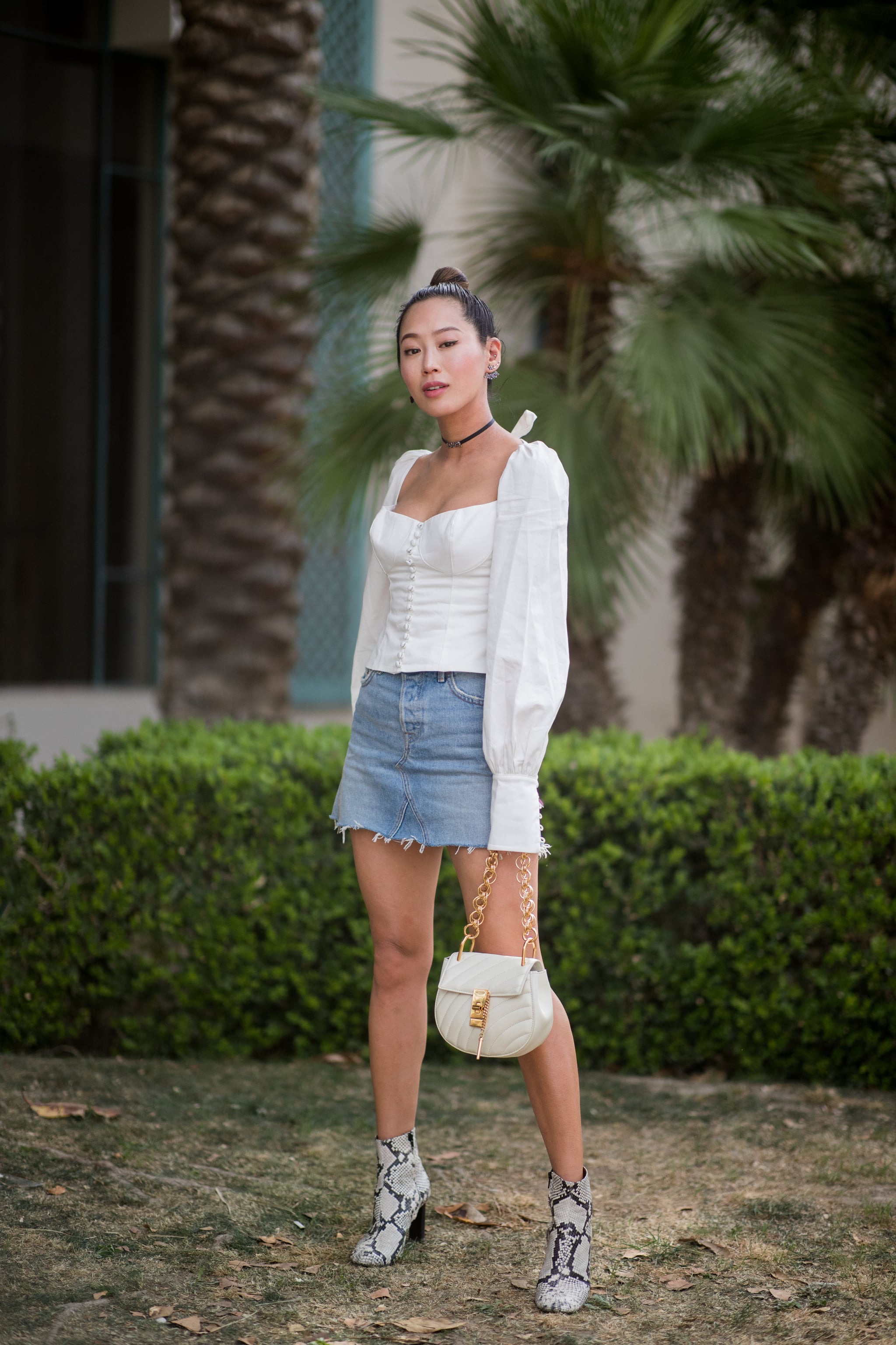 denim skirt with boots outfit