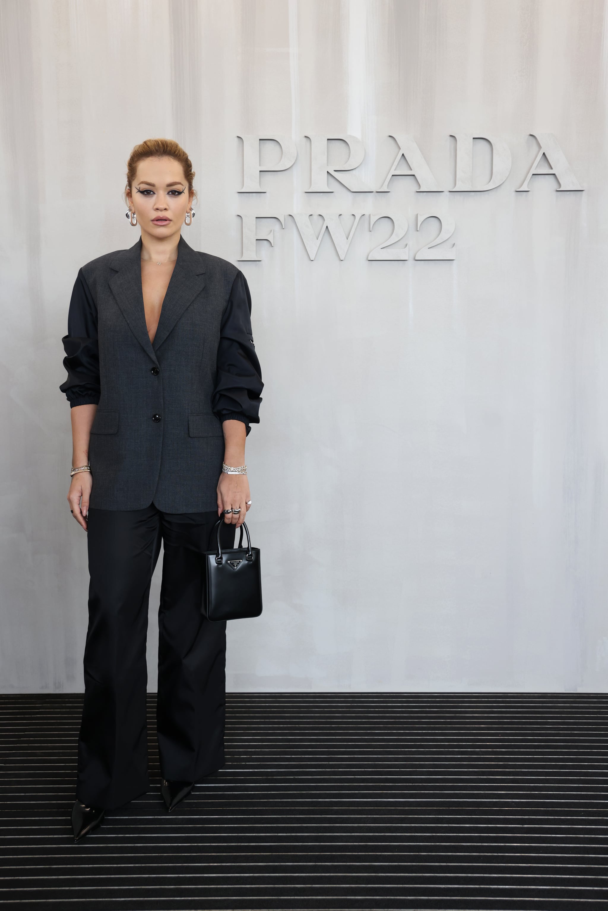 Rita Ora Attends Prada's Fall 2022 Womenswear Fashion Show | Storm Reid  Brightens Up Prada's Front Row in a Yellow Belted Shirtdress | POPSUGAR  Fashion Photo 8