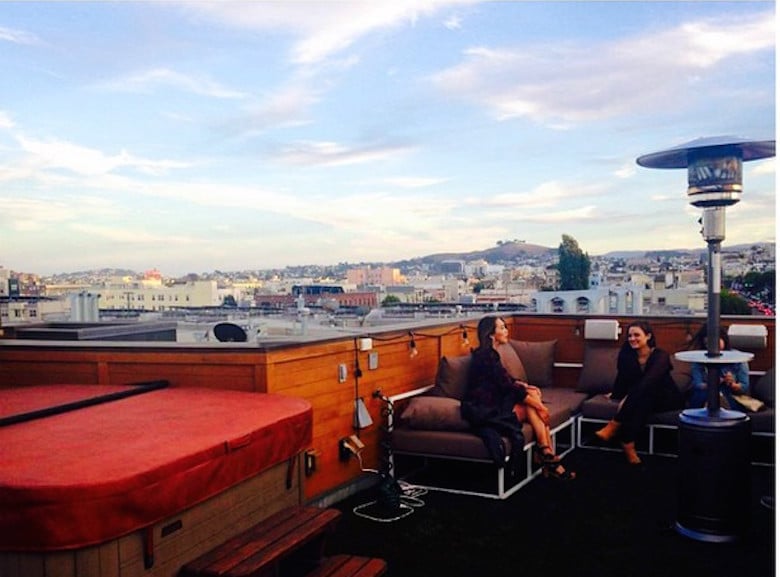 Have drinks at a rooftop bar.