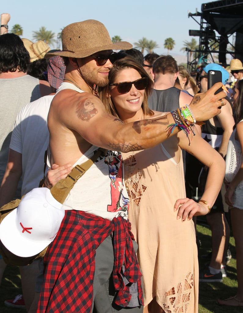 Kellan Lutz showed off his guns while taking a selfie with Ashley Greene.