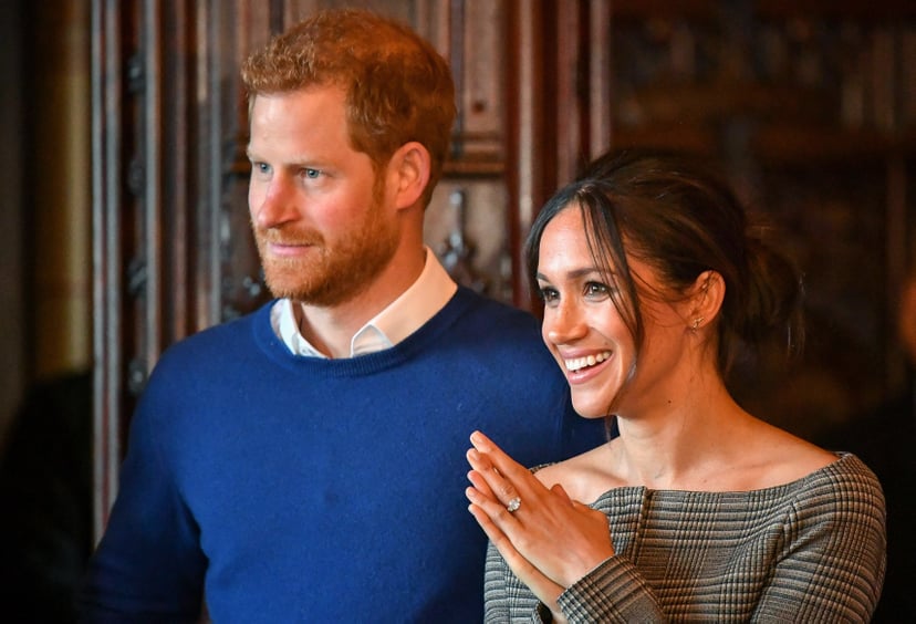 CARDIFF, WALES - JANUARY 18:  Prince Harry and Meghan Markle watch a performance by a Welsh choir in the banqueting hall during a visit to Cardiff Castle on January 18, 2018 in Cardiff, Wales. (Photo by Ben Birchall - WPA Pool / Getty Images)