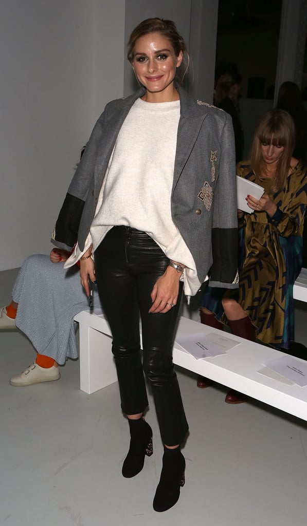 While taking in the shows in London, the fashion pro reworked leather pants with a sweater and blazer thrown casually over her shoulders.