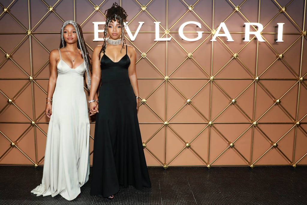 Chloe x Halle Wear Peter Do Slip Dresses at Bulgari Party