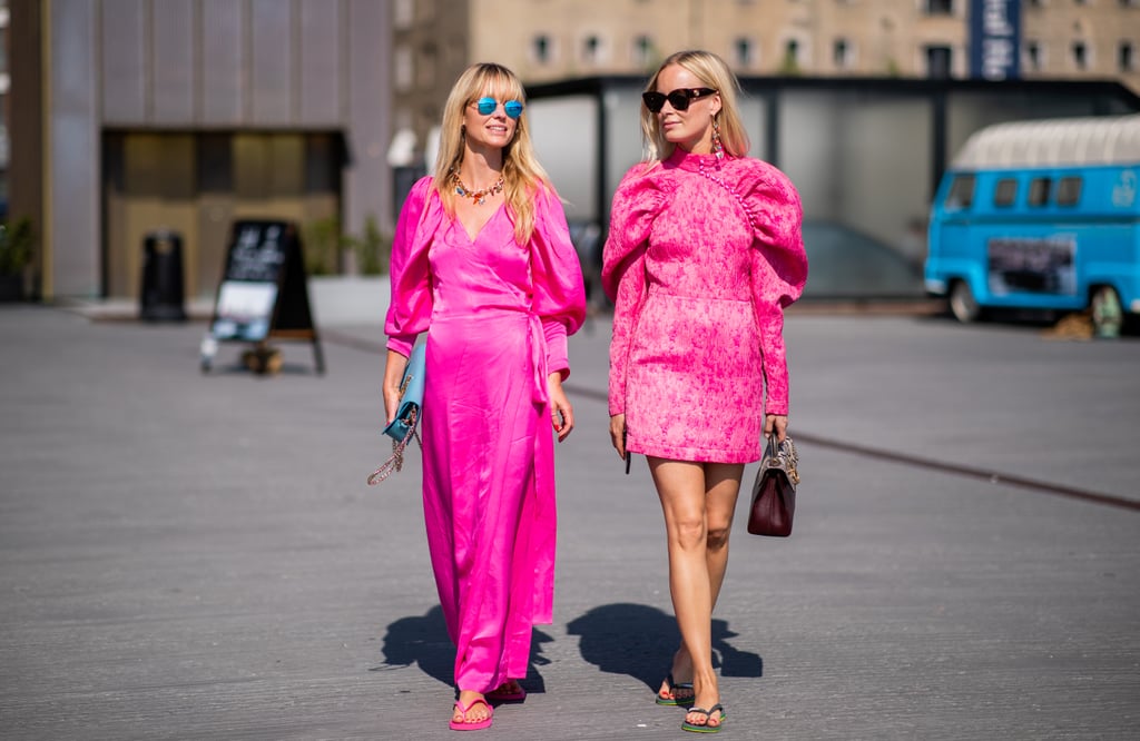 Styling flip flops with neon pink dresses.