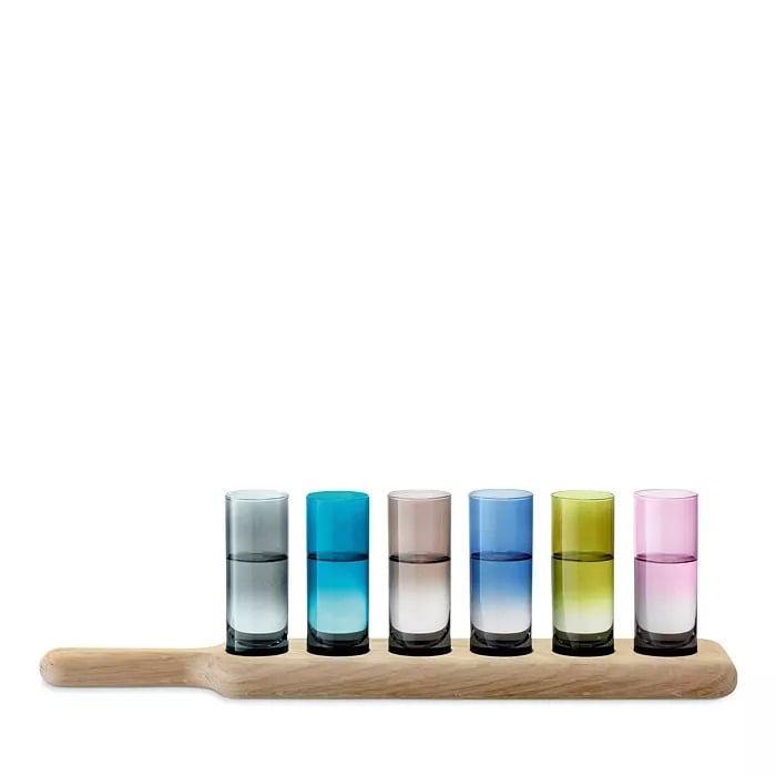 LSA Oak Paddle & Vodka Set ($100)
If you've got a spirits connoisseur in your friend group, treat them to this intriguing paddle, complete with six colorful glasses for sipping and sharing. Bundle it with their favorite tipple or something new and then do a taste test together.