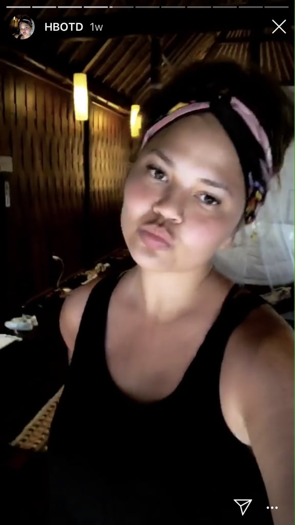 Chrissy Teigen just brought back her "Headband of the Day" Instagram Story series with her daughter, Luna Stephens, while on a family vacation in Thailand. In the video, Stephens can be seen placing a headband on her head, with many headbands around her body, as her dad, John Legend, sings the theme song. 
The series first appeared last year when the family enjoyed a long vacation with their children in Bali. During their envy-inducing vacation, Teigen entertained herself (and trolled her hairstylist, Jen Atkin) with a series she calls "Headband of the Day."
Each day, she filmed herself showing off her latest stylish headband while on vacation. She even highlighted the series on her Instagram so you can watch them in order, complete with a theme song written, produced, and performed by the John Legend. 
Now that Stephens has joined in on the fun, we see Nick Jr. picking up the series next. Check out the cute photos ahead.