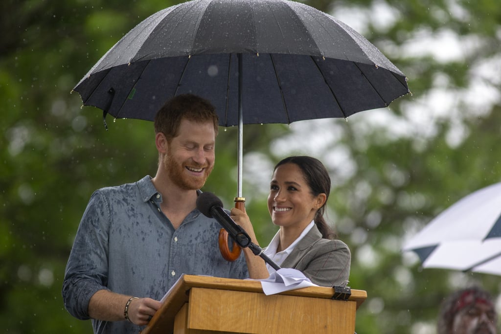 Meghan Markle Holding Prince Harry's Umbrella October 2018