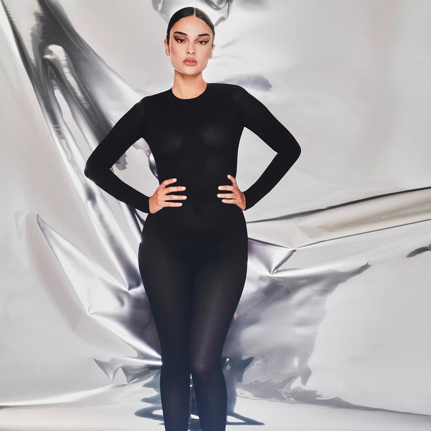 A Black Bodysuit: Skims Sheer Sculpt Catsuit, The Sheer Clothing Trend Is  Worth Investing In — See Our Top Picks