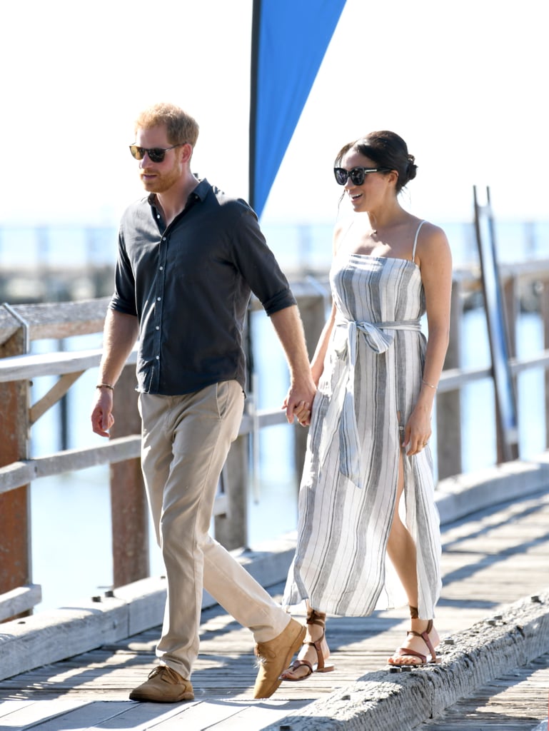 Meghan also showed off a breezy striped Reformation dress with sandals while visiting Fraser Island in Australia.