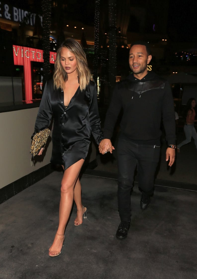 Chrissy Teigen Stepped Out in a Sexy Satin Shirtdress