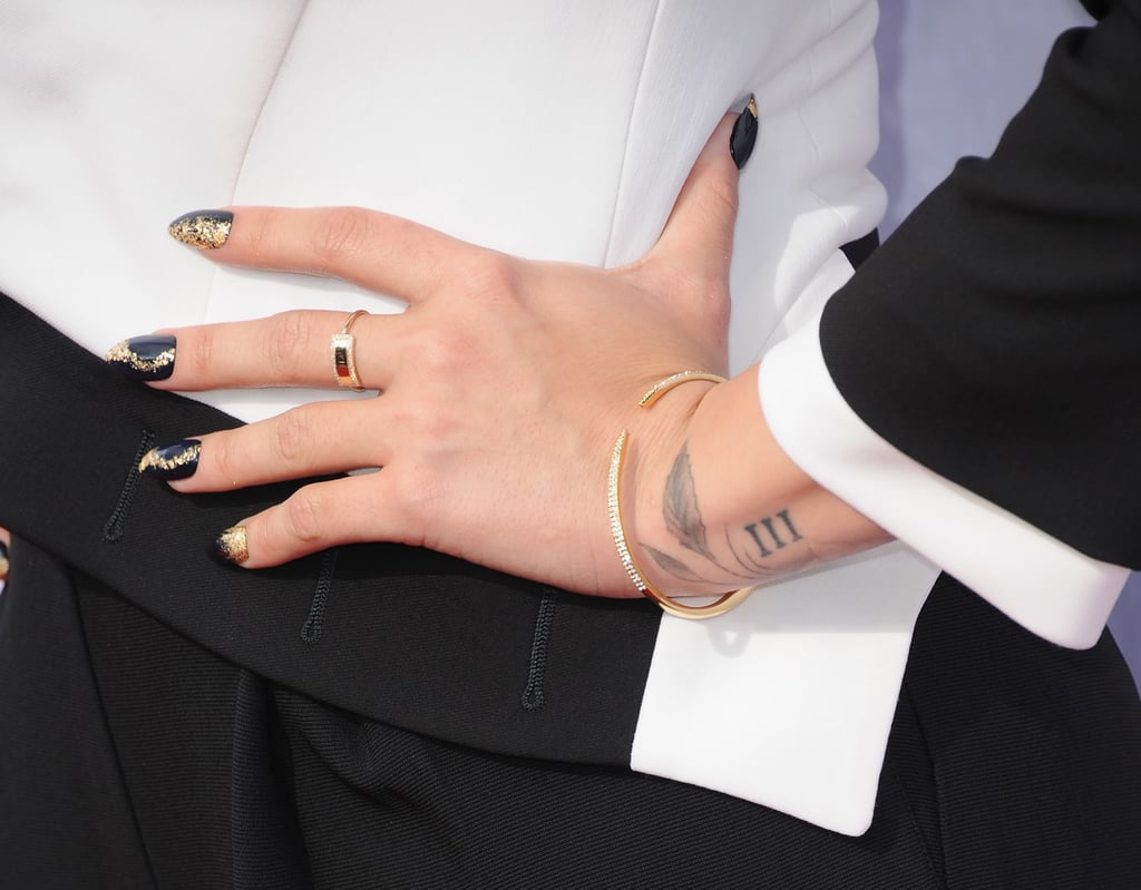 Demi Lovato Rose Finger Tattoo