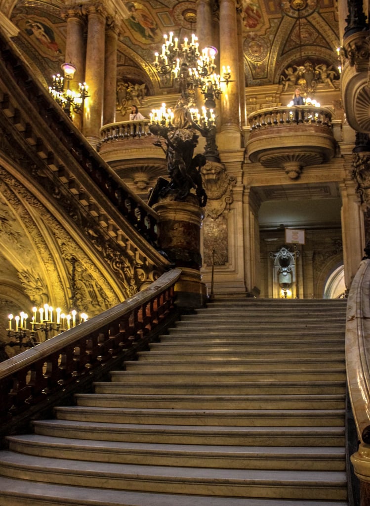 Looking to learn more about French theater? Then be sure not to miss the Palais Garnier. This 1,979-seat opera house — often referred to as Opéra Garnier — is one of the most famous symbols of Paris. However, many people are usually surprised to find out this theater is now mainly used for ballet. Even if you don't have time for a show, I highly recommend taking a tour. In doing so, you'll be able to discover some of the most mythical sites, such as the Grand Stairway.