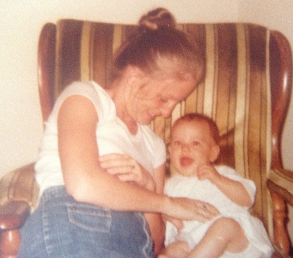 "This photo of my mom and sister exemplifies her golden California style. Even kicking back around the house in jeans, a white tee, and hair up can be chic — just don't forget to complete the look with a simple gold necklace!"
— Kelly Schwarze