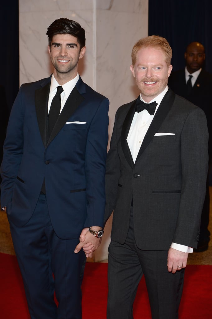 Husbands Jesse Tyler Ferguson and Justin Mikita held hands on the red carpet.