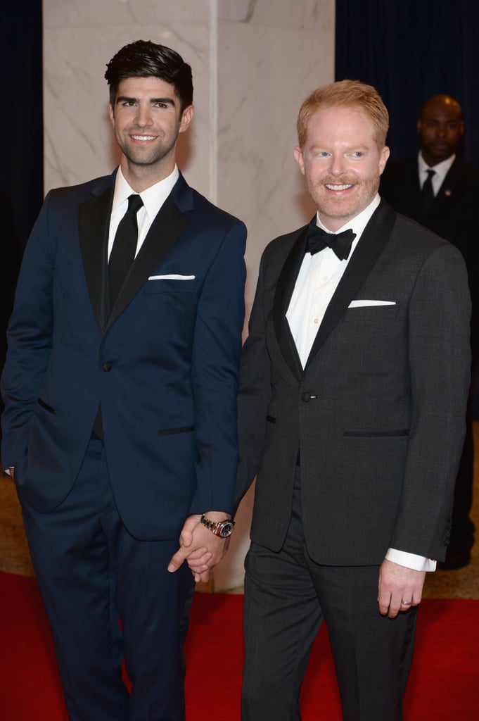 Husbands Jesse Tyler Ferguson and Justin Mikita held hands on the red carpet.