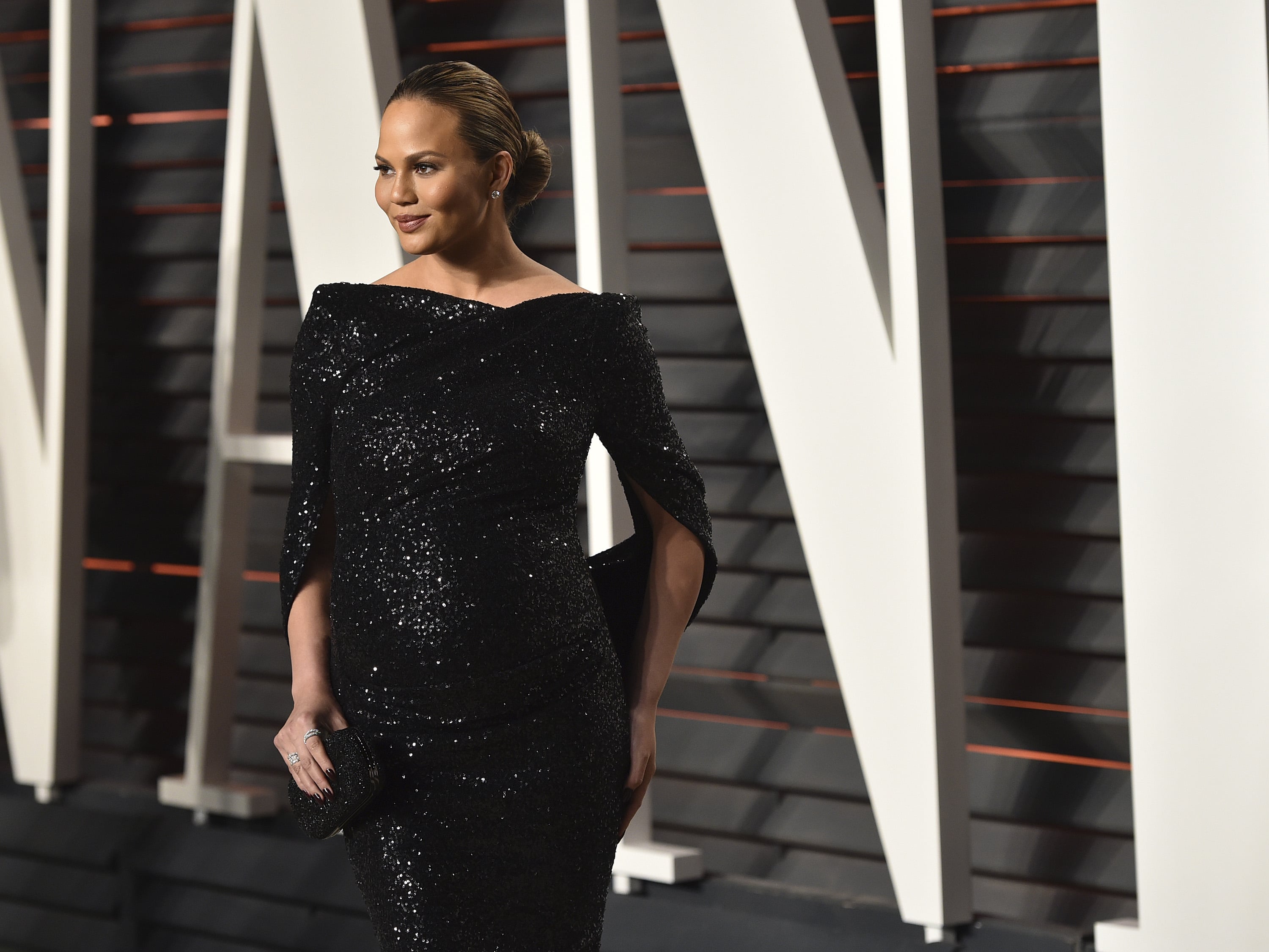 chrissy teigen after party dress Chrissy Teigen Says Oscars Party Dress Revealed Her 'Boob Lift Scars'